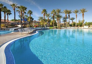 A swimming pool with lounge chairs and palm trees. - Marriott Shadow Ridge II - Enclaves, 2 Bedroom Unit - Sleeps 8 "Coachella" (Palm Desert)
