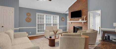 Télévision, cheminée, jeux vidéo