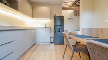 Quadruple Room, Garden View | Private kitchen