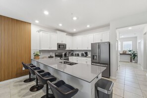 Fridge, microwave, oven, stovetop - 3BR Retreat at ChampionsGate near Disney (Kissimmee)