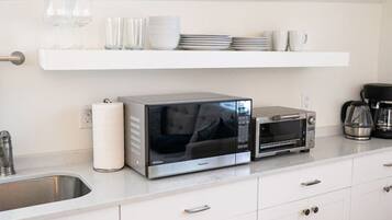 Fridge, microwave, coffee/tea maker, toaster