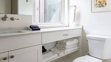 Hair dryer, towels, soap, shampoo