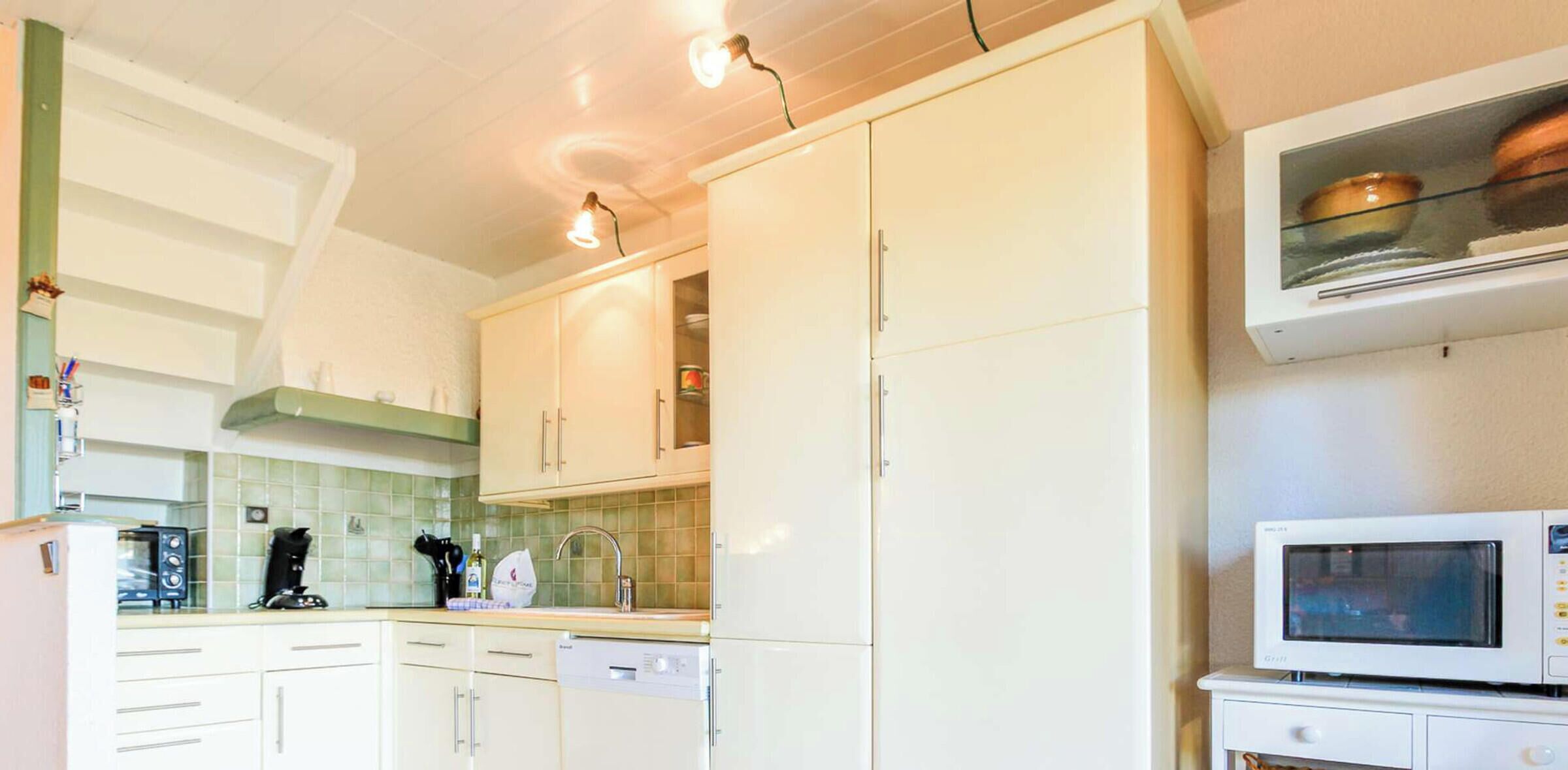 Fridge, oven, coffee/tea maker, toaster