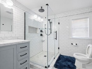 Shower, hair dryer, towels, soap