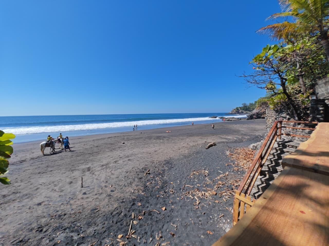 On the beach, sun loungers, beach towels