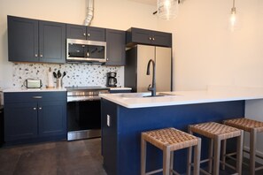 Fridge, microwave, oven, stovetop - New 2BR Condo w/Balcony Above Inn Between (Indian River)