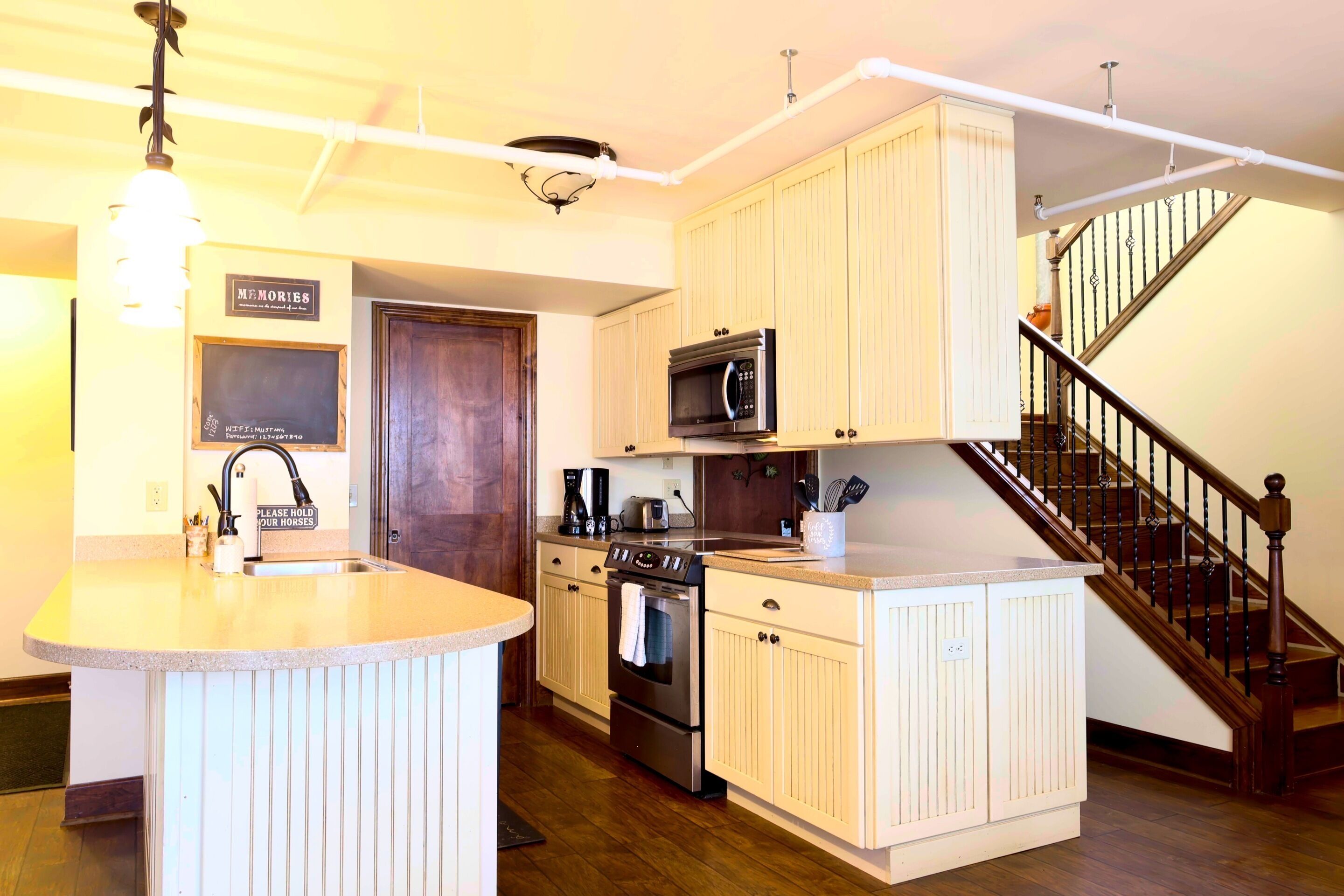 Coffee/tea maker, fridge, microwave, oven