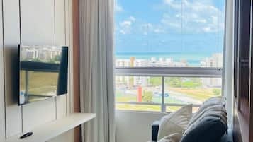 Apartamento luxo, vista para o mar | Área de estar