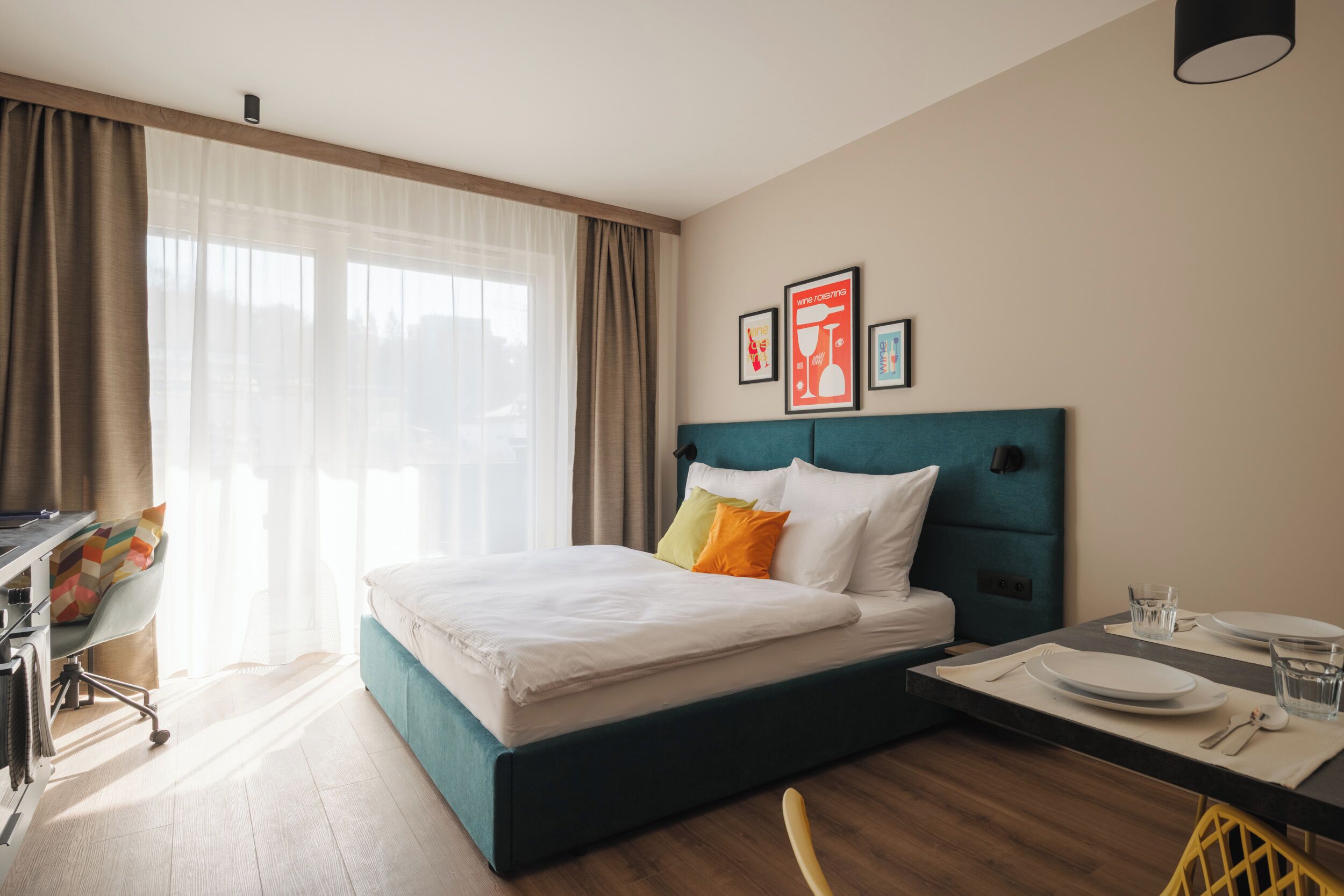 Select Comfort beds, desk, laptop workspace, blackout curtains