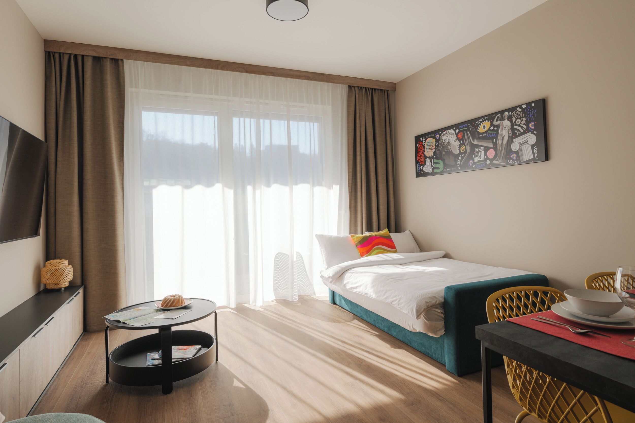 Select Comfort beds, desk, laptop workspace, blackout drapes