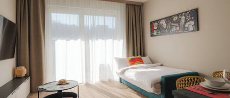 Select Comfort beds, desk, laptop workspace, blackout drapes