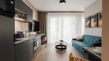 Select Comfort beds, desk, laptop workspace, blackout curtains