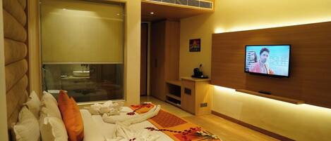 Desk, laptop workspace, blackout drapes, iron/ironing board