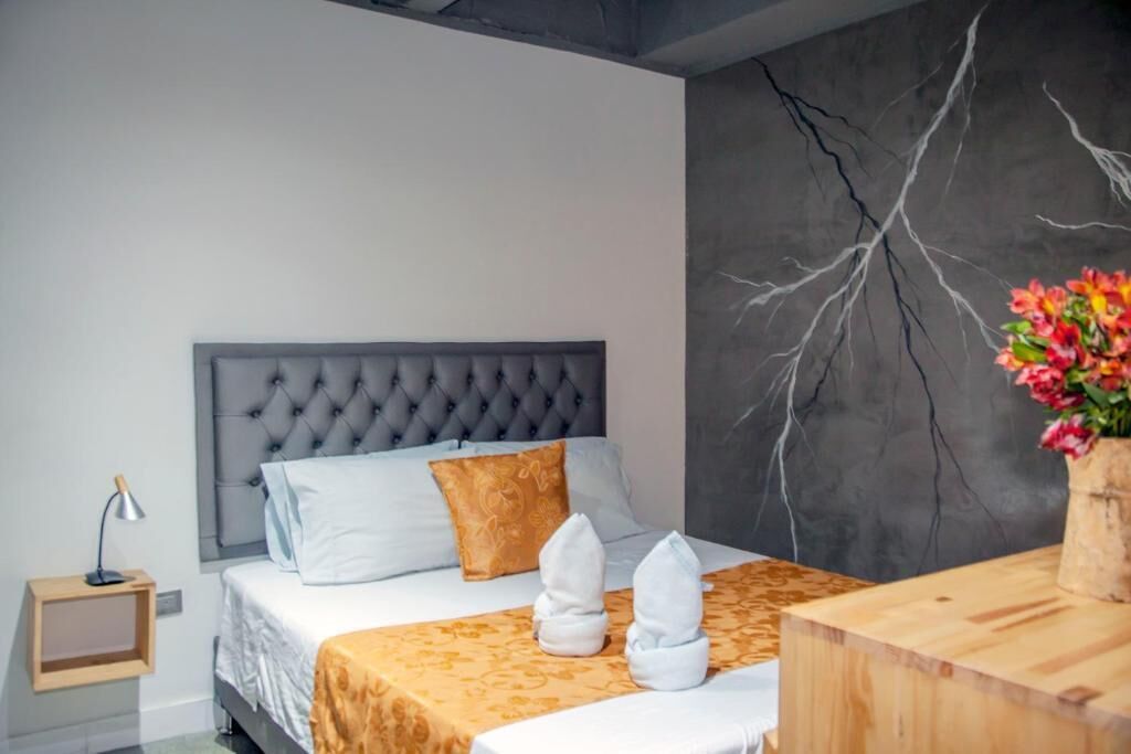 1 habitación, tabla de planchar con plancha, wifi y ropa de cama 