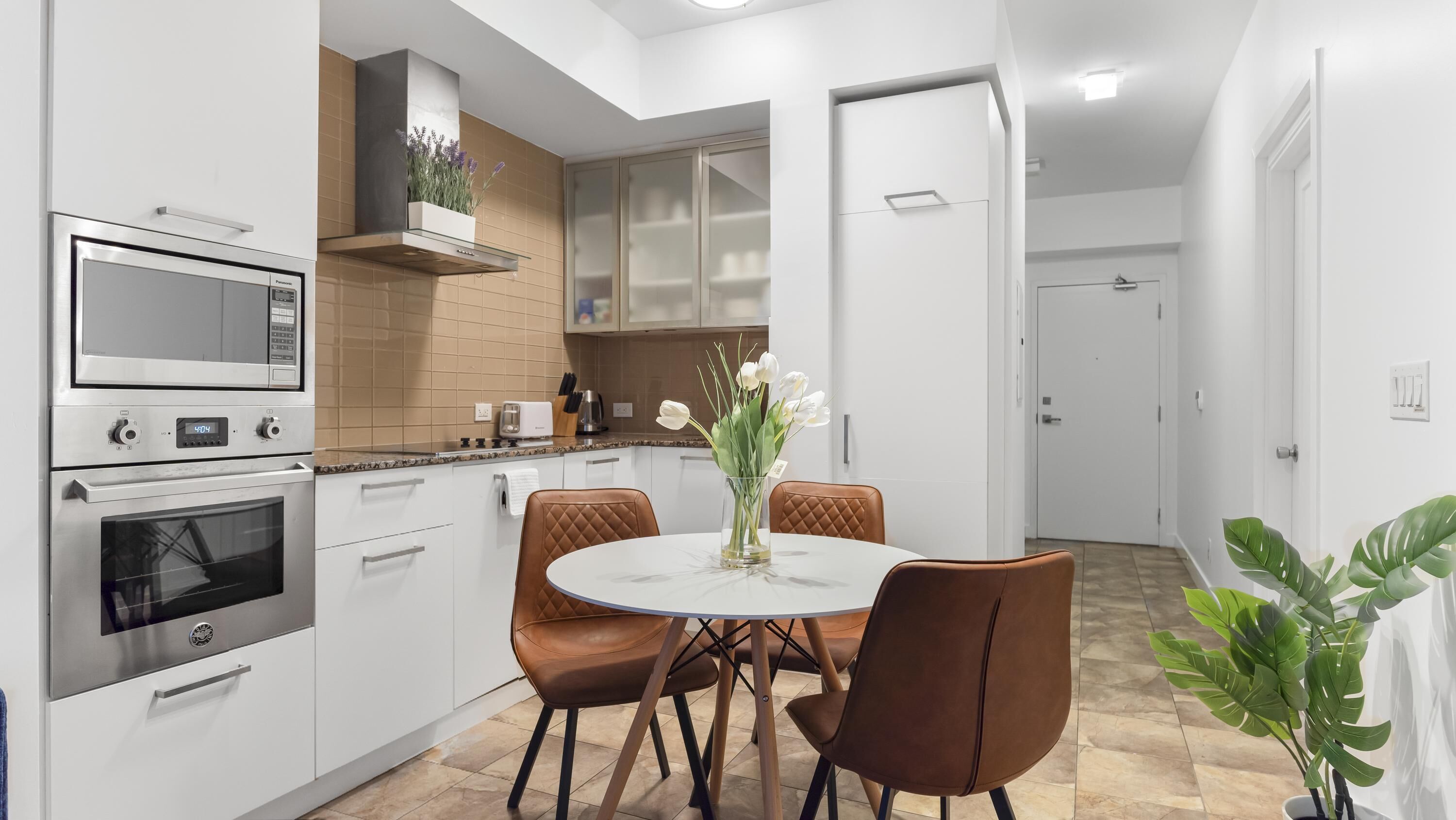 Standard Suite, 1 Queen Bed with Sofa bed, Non Smoking | Private kitchen | Full-sized fridge, microwave, oven, stovetop