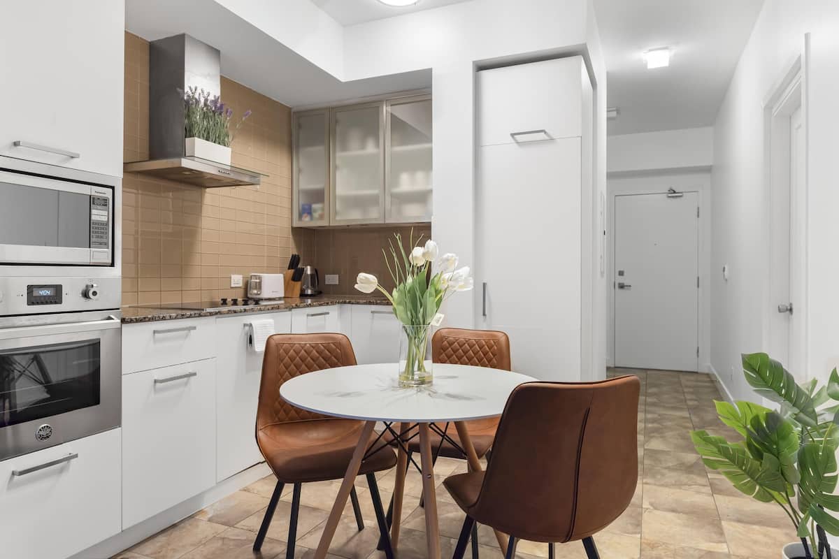 Standard Suite, 1 Queen Bed with Sofa bed, Non Smoking | Private kitchen | Full-sized fridge, microwave, oven, stovetop