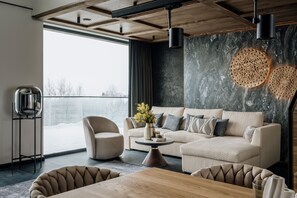 Luxury Villa, Hot Tub | Living area | 50-cm Smart TV with cable channels, fireplace, heated floors