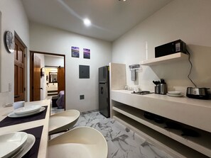 Full-sized fridge, microwave, stovetop, cookware/dishes/utensils - Cabo Downtown Studios (Cabo San Lucas)