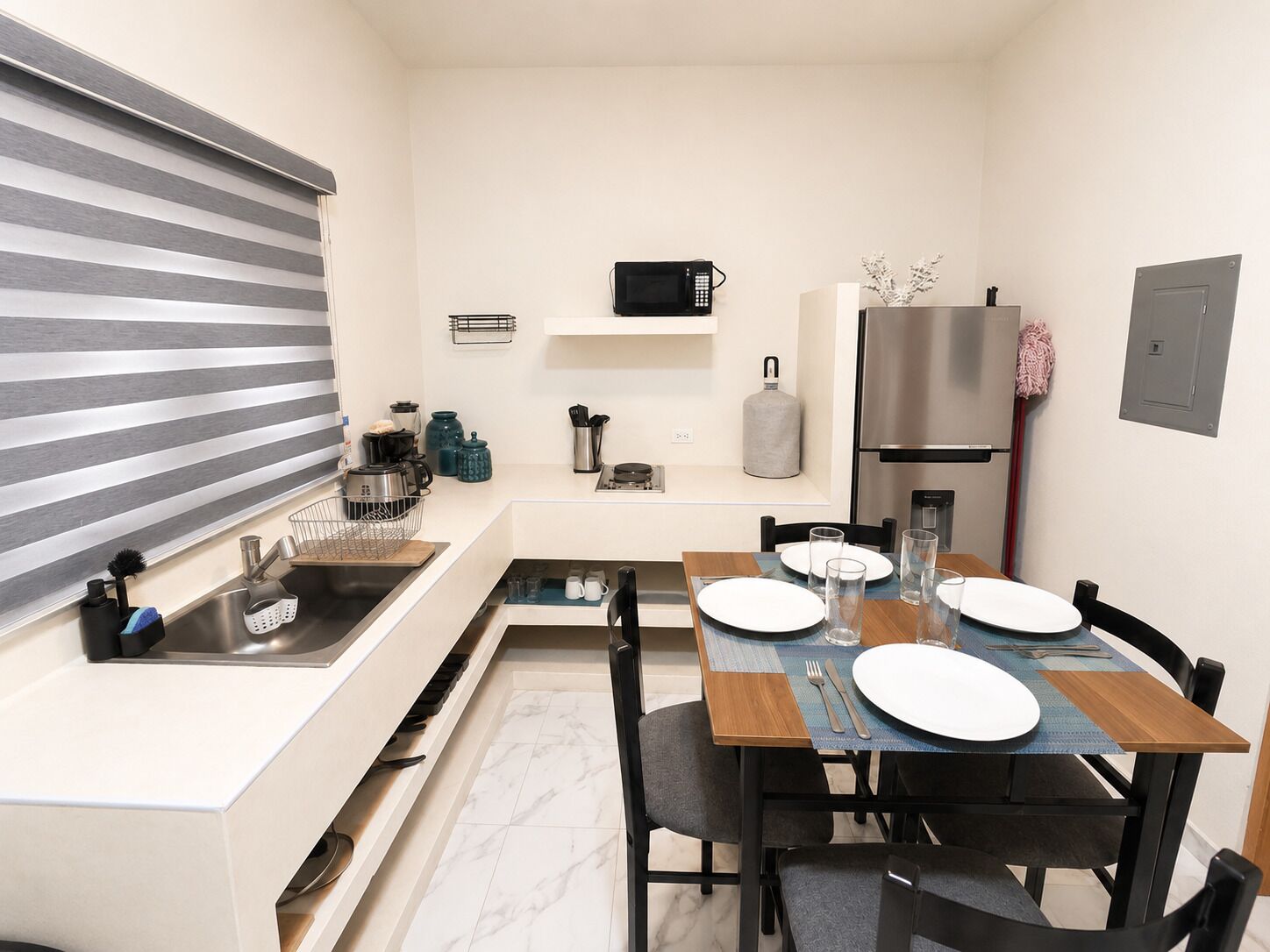 Family Apartment | Private kitchen | Full-size fridge, microwave, stovetop, cookware/dishes/utensils