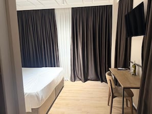 Dobbelt- eller tomannsrom, balkong, byutsikt