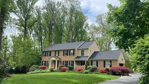 A two-story house with a front porch, a driveway, and a well-maintained lawn. - 1.7 Miles from PGA Championship - tremendous outdoor space with back deck (Berwyn)