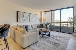 TV, fireplace - Balcony + Community Perks: Modern Atlanta Condo! (Atlanta)