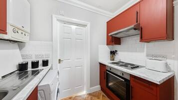 Fridge, microwave, cookware/dishes/utensils