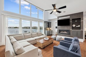 TV, fireplace - Refined Coastal Home with Pool, Spa, and Community Amenities (Destin)