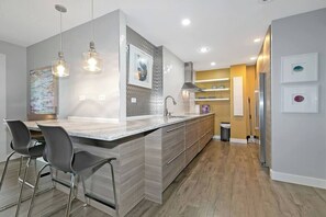 Fridge, microwave, oven, stovetop - Sleek 19th-Floor Condo w/ Balcony Views (Atlanta)