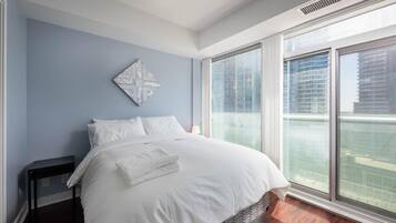 Suíte presidencial, várias camas | Cortinas blackout, ferros/tábuas de passar roupa, Wi-Fi de cortesia