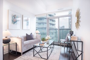 Elite-Suite, Mehrere Betten | Wohnbereich