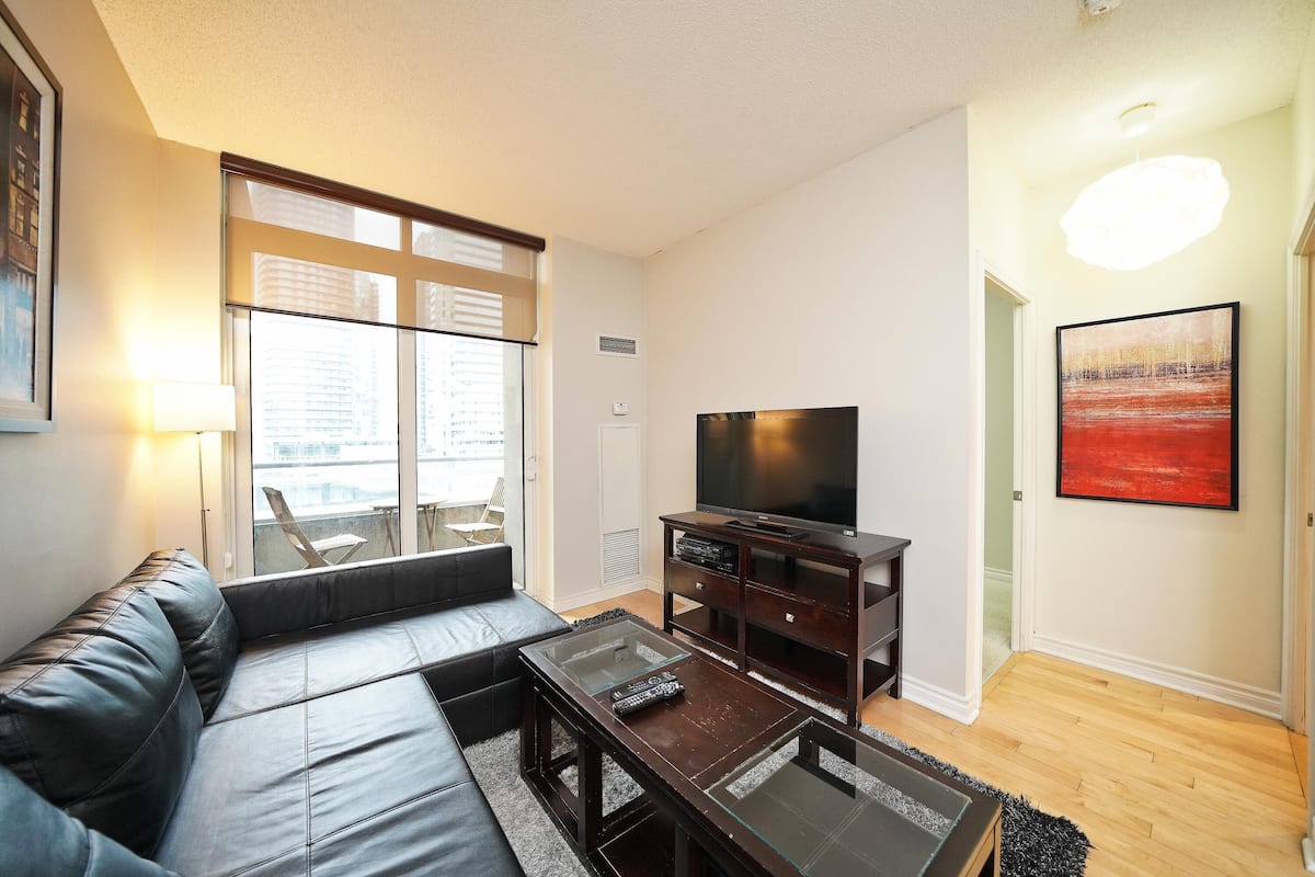 Phòng Suite Deluxe, nhiều giường | Khu phòng khách