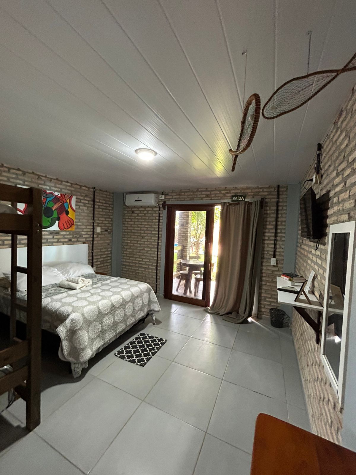 Quarto quádruplo família, sacada, vista para o jardim | Frigobar, Wi-Fi de cortesia, acesso para cadeiras de rodas