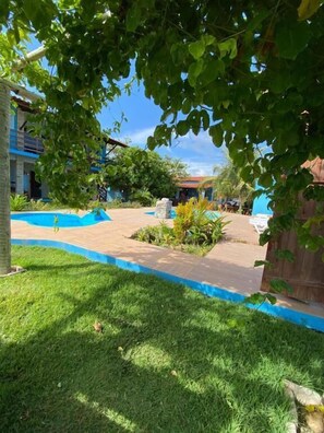 Comfort Triple Room, Balcony, Garden View | Property grounds - Pousada Manga Azul (Barra de Camaratuba)