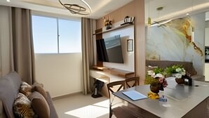 Apartemen | Area keluarga | TV layar datar