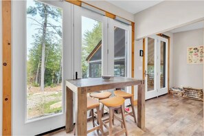 Dining - Cozy and quiet lakeside cottage with large screened in porch to dine and relax (Ompah)