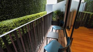Suíte luxo, 1 cama King | Terraço/pátio