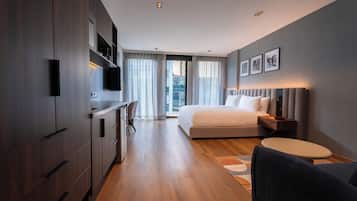 Desk, laptop workspace, blackout curtains, free WiFi