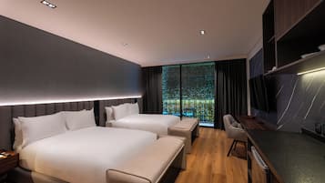 Deluxe Suite, 2 Queen Beds | Desk, laptop workspace, blackout curtains, free WiFi