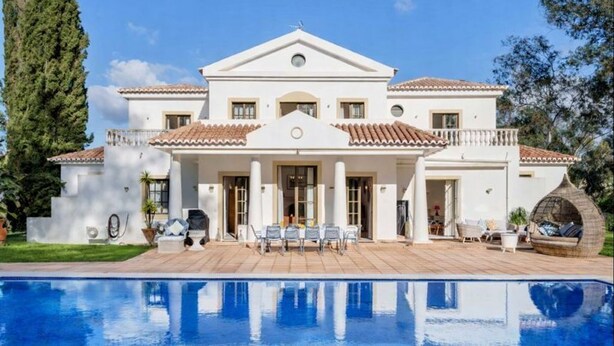 A large, two-story building with a pool in front. - Casa Charador - Luxury Golf Villa (Alvor)