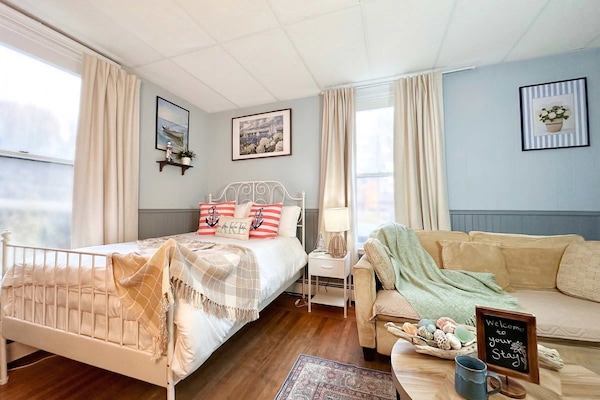 Living Room with Queen Bed and Sofa Bed