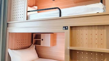 Premium bedding, down duvets, memory-foam beds, in-room safe