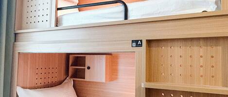 Premium bedding, down duvets, memory-foam beds, in-room safe