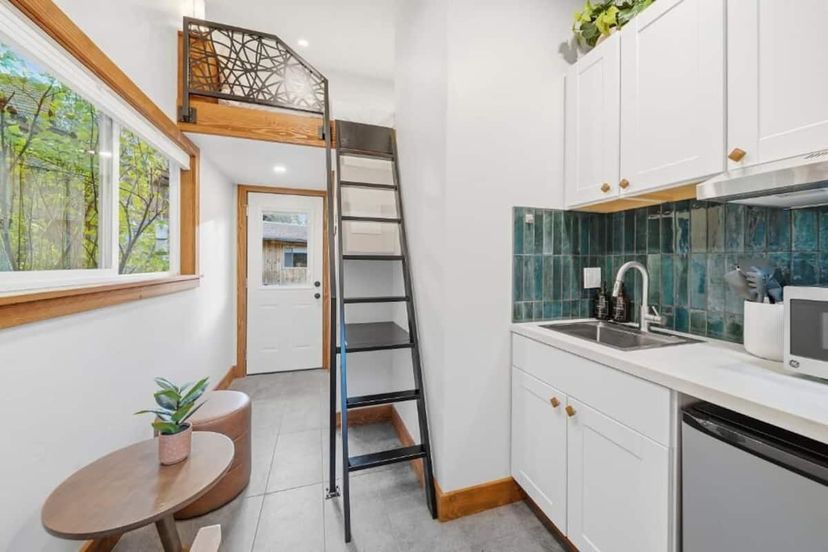 Design Loft, Kitchen, Courtyard View | Down comforters, memory foam beds, laptop workspace, blackout drapes
