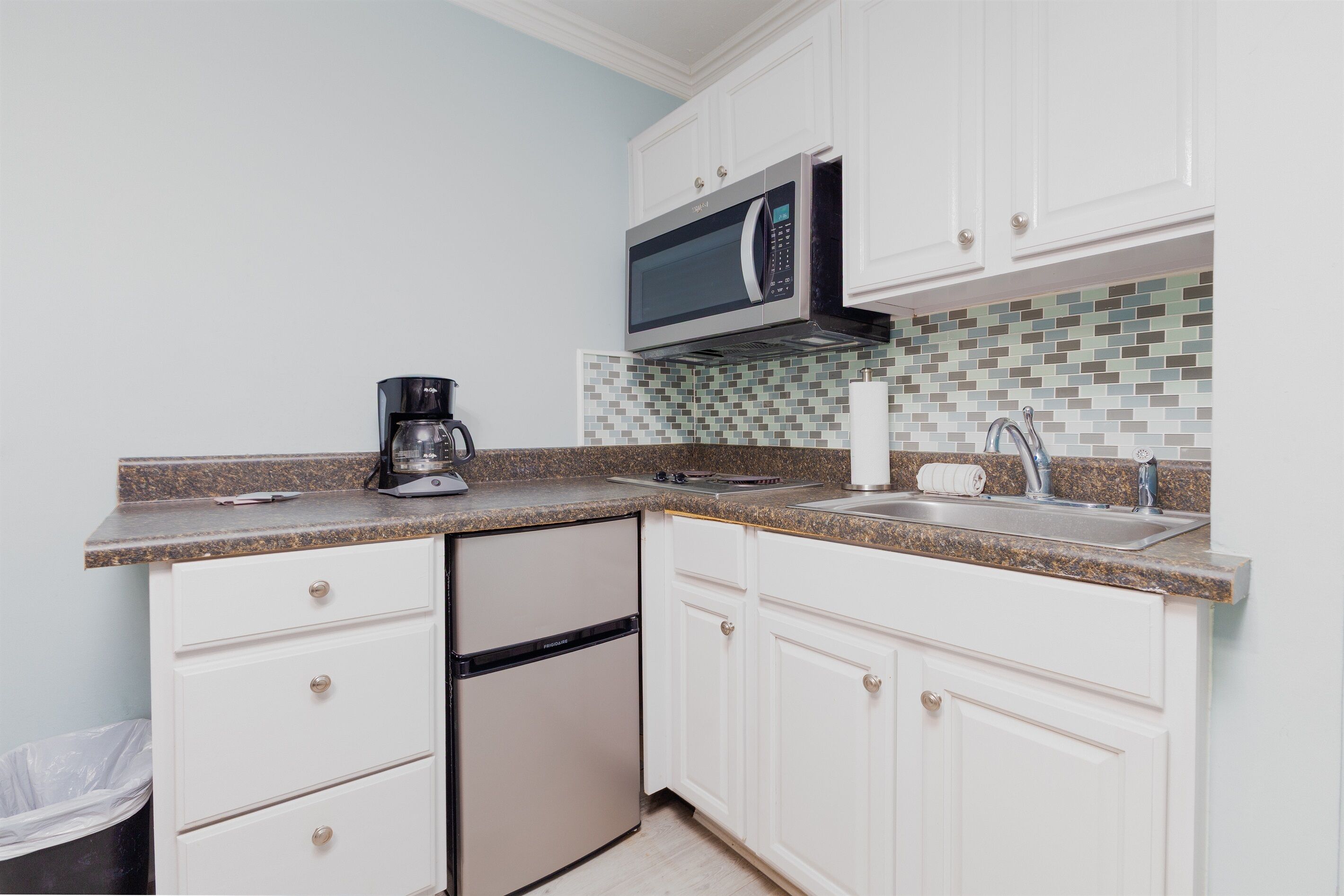 Fridge, microwave, stovetop, coffee/tea maker