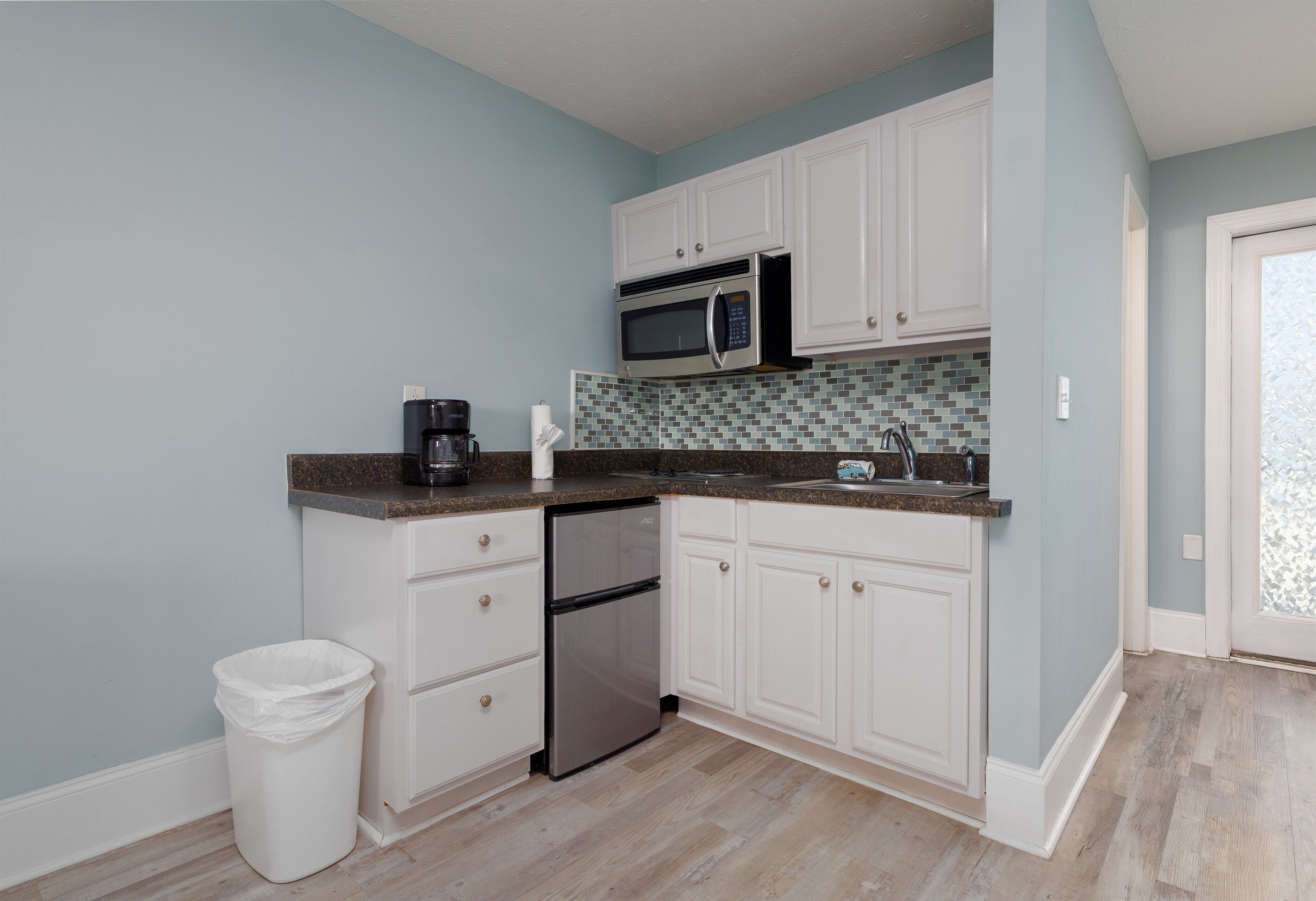 Microwave, stovetop, coffee/tea maker, toaster