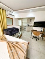 Junior Room | Individually furnished, desk, laptop workspace, iron/ironing board