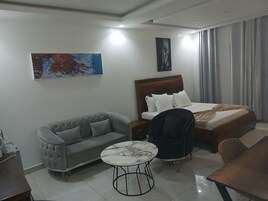 Superior Studio, Multiple Bedrooms, Balcony, City View | Individually furnished, desk, laptop workspace, iron/ironing board