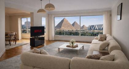 3 Pyramids + Grand Egyptian Museum View with a Roof Top | 3BR