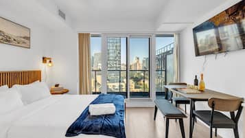 Basic Studio Suite, 1 Queen Bed, Non Smoking | Living area | 65-inch TV with digital channels